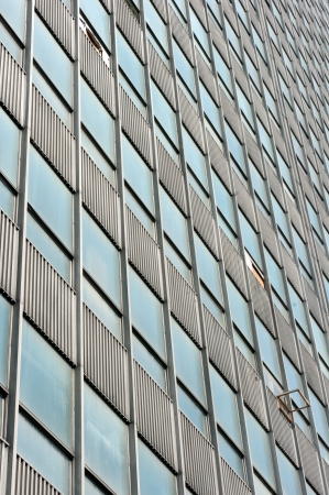 The windows in a modern building built of glass and steel.の写真素材