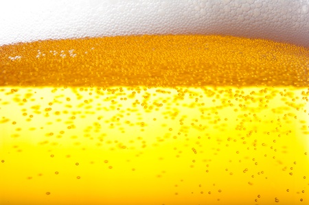 Air bubbles in beer and foam.の写真素材