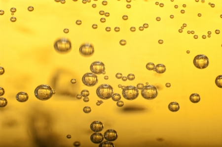 Beer bubbles in the high magnification and close-up.の写真素材