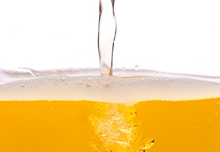 Pouring beer into a mug.の写真素材