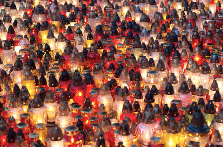 Many candles in the cemetery.