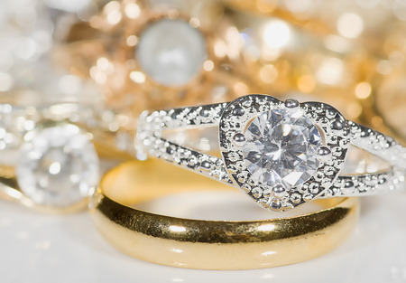 Rings of silver and gold with precious stones.の写真素材