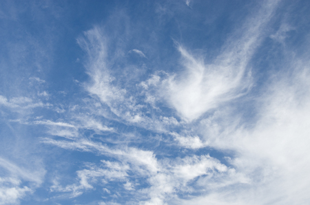 Blue sky with clouds on a sunny summer day.の写真素材