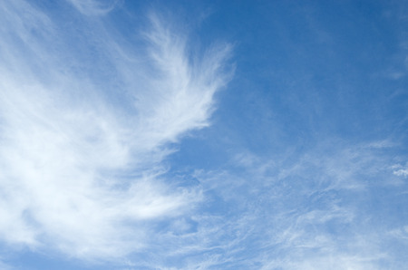 Blue sky with clouds on a sunny summer day.の写真素材