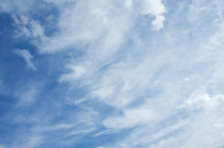 Blue sky with clouds on a sunny summer day.の写真素材