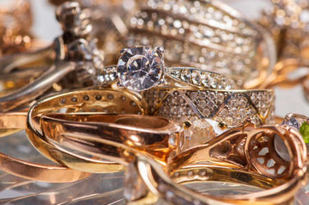 Lots of old gold rings with stones.の写真素材