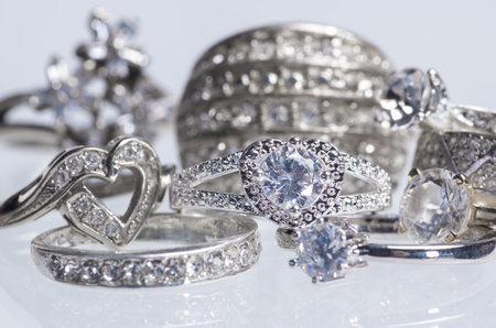 Silver rings with crystals on a white background.の写真素材