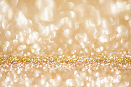 golden glitter texture Colorfull Blurred abstract background for birthday, anniversary, new year eve or Christmas.の写真素材