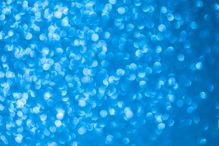 Abstract blue bokeh background, defocused lights. Christmas and New Year concept.の写真素材
