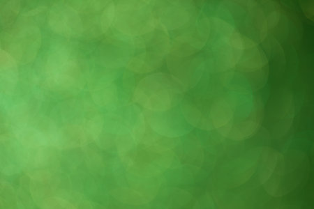 green abstract bokeh background, christmas background. defocusedの写真素材