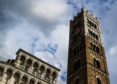 Lucca cathedral facade in a cloudy day of summerの写真素材