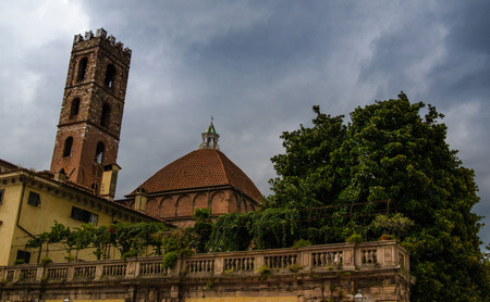 Nice balcony in Lucca center with a church behindの写真素材