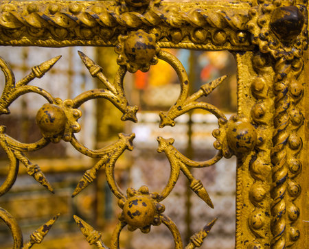 Church gate detail into Lucca cathedral in Italy