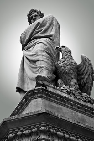 Dante Alighieri statue by Enrico Pazzi in Santa Croce square in Florenceのeditorial素材