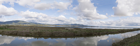 Wide panoramic view of a antural oasis in Tuscanyの写真素材