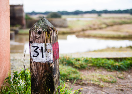 Indication of a safe path in a natural oasis in Tuscanyの写真素材