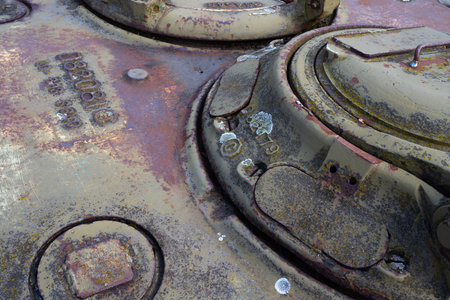 rusty metal parts of an old car, closeup of photoの写真素材