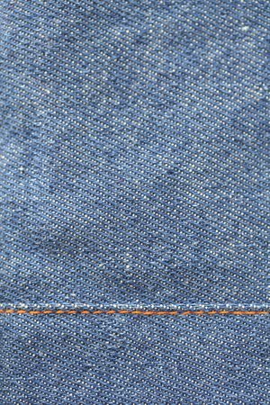 Close up shot of blue jeans texture.の写真素材