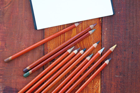 Blank Notebook and Colorful Pencilsの写真素材