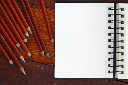 Blank Notebook and Colorful Pencilsの写真素材