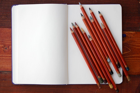 Blank Notebook and Colorful Pencilsの写真素材