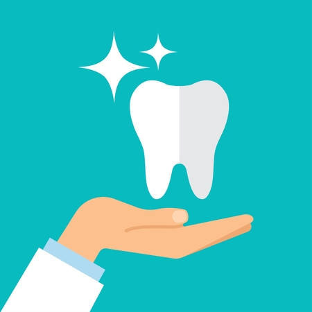 A healthy tooth on the hand of the dentist. Flat design. Vector illustrationのイラスト素材