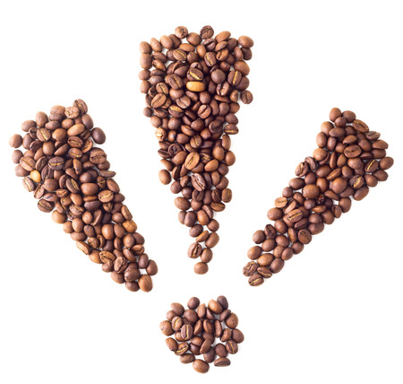 Triple exclamation mark from coffee beans on white isolation backgroundの写真素材