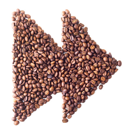 'Fast forward symbol' from coffee beans on white isolated backgroundの写真素材