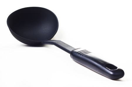 Plastic kitchen utensil on white isolated backgroundの写真素材