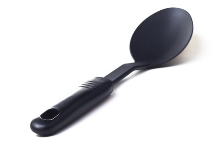 Plastic kitchen utensil on white isolated backgroundの写真素材