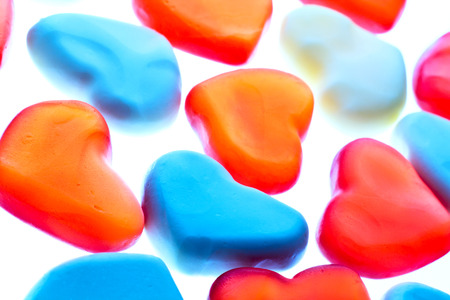 Nice gummy hearts close up on white backgroundの写真素材