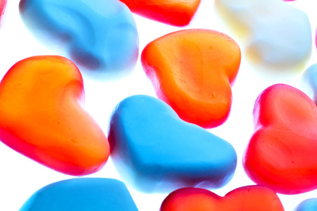 Nice gummy hearts close up on white backgroundの写真素材