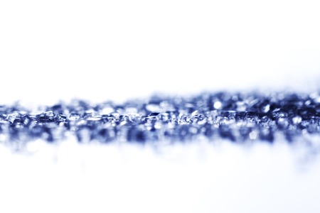 Close-up macro sugar crystals on white backgroundの写真素材