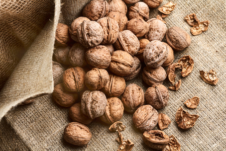 Walnuts on craft loft clothの写真素材
