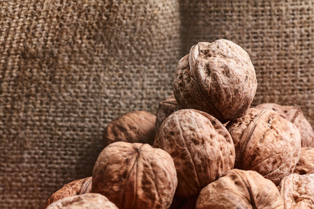 Walnuts on craft loft clothの写真素材
