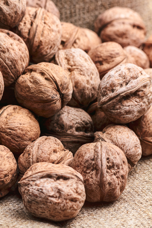 Walnuts on craft loft clothの写真素材