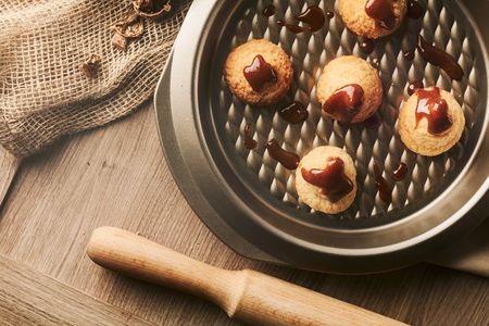 Handmade cookies with walnut on craft backgroundの写真素材