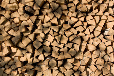 Woodpile background yellow, sunlight