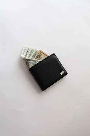 wallet with sticking out banknotes の写真素材