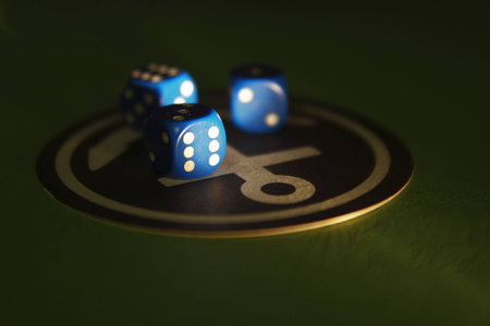 Dice in a ray of the lightの写真素材