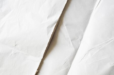 Creative background with scattered overlay of crumpled papers.の写真素材