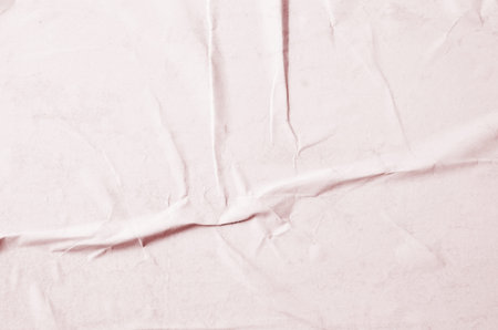 Creative background with scattered overlay of crumpled papers.