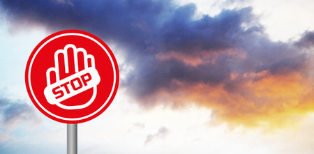 Stop sign against blue and orange sky with clouds. 3d illustrationの写真素材