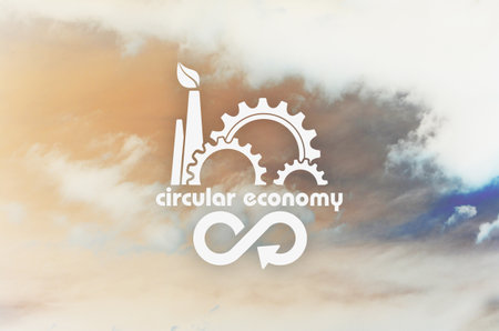 Cogwheels and arrows against blue sky with white clouds backgroundの写真素材