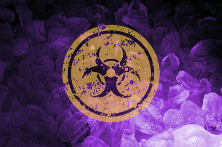 Coronavirus biohazard symbol on crushed ice background. Quarantine conceptの写真素材