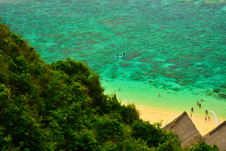 Fresh morning view of Indian Pacific sea ocean with yellow sandy beach and gazebo from top of the hill for honeymoon vacationの写真素材
