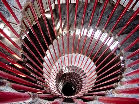 Old spiral staircase with steps in metal decoratedの写真素材