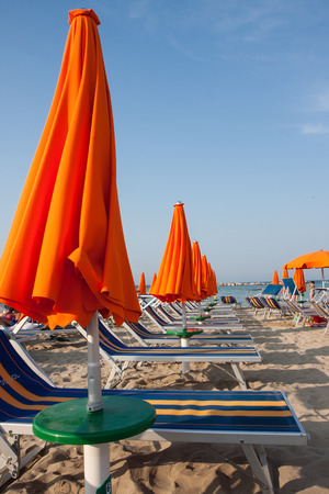 Umbrellas and sunbeds in Rimini and Riccione and Cattolica Beach, Italyの写真素材