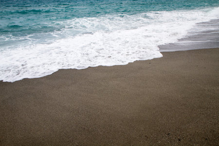 summer with beautiful beach in Calabria in rough seas