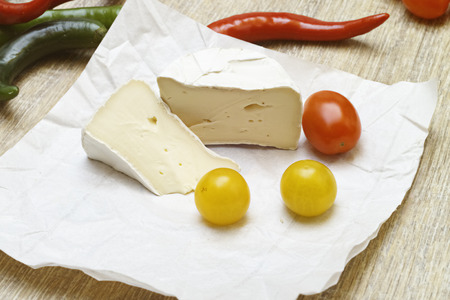 Soft cheese with tomatoesの写真素材